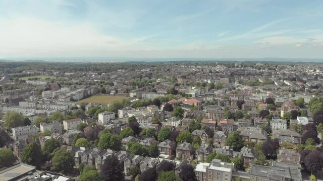 Aerial drone view of residential streets and houses in city of Bristol, UK