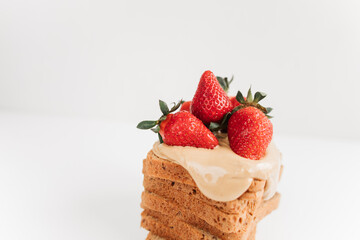 toast bread with peanut paste and strawberries