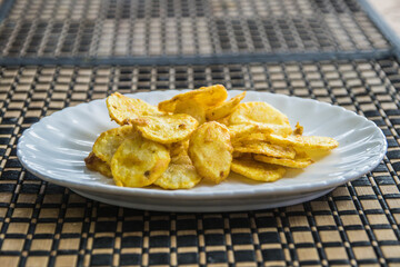 Potato fry or chips being served in a plate