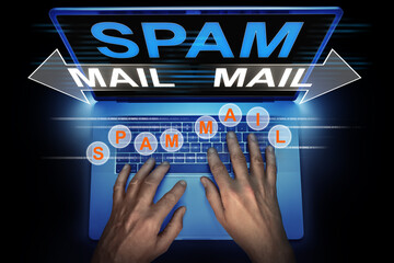 hacker is using his computer for spreading spam mails