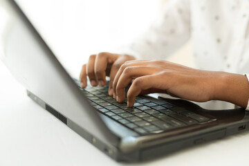 beautiful young african woman with laptop	
