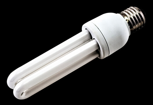 Energy saving bulb isolated on black background close up view