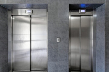 closed metal doors of modern elevators