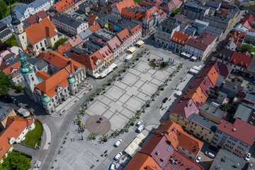 Pszczyna Aerial View. Main market square in historical european city. Colorful old buildings and clear blue sky. Pszczyna, Upper Silesia, Poland.