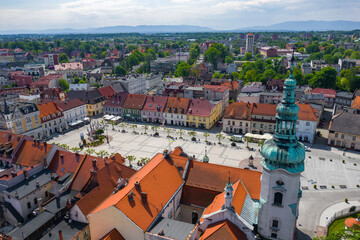 Fototapeta na wymiar Pszczyna Aerial View. Main market square in historical european city. Colorful old buildings and clear blue sky. Pszczyna, Upper Silesia, Poland.