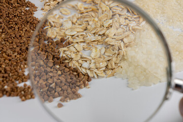 Mixed cereals, buckwheat, oatmeal, rice on the background