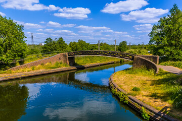 A bridge at the junction of the Birmingham and Dudley canals in summertime