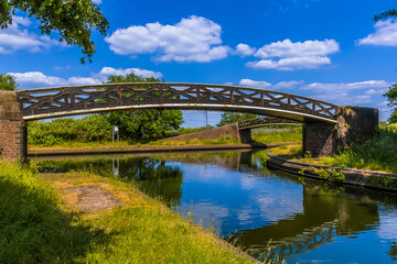 A view of a bridge on the Dudley canal in summertime
