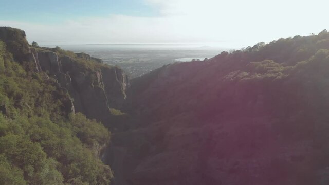 Aerial drone view of village of Cheddar, Somerset, from Cheddar Gorge