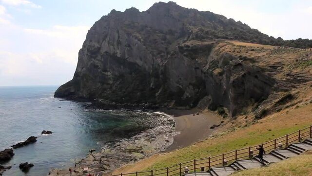 Scenery of Seongsan Ilchulbong (Sunrise Peak), archetypal tuff cone on Jeju Island in South Korea in March 2017.