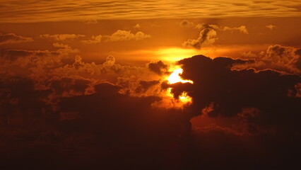 Obraz na płótnie Canvas Beautiful orange sunset sky with clouds landscape. 