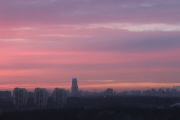 Naklejka premium sunset over the city