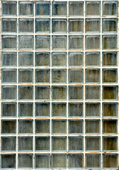 pattern of dirty glass block wall
