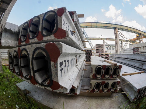 Gatchina, Russia - July 23 2019. ..Workers in the workshop of the  House-building plant "Gatchinsky SSK", producing panels for construction and reinforced concrete structures...
