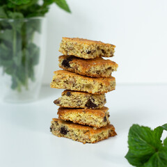 Homemade cookies with chocolate chips are stacked on a table. Keto almond flour cookies. Congo Square.