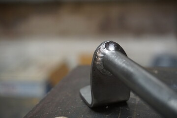 TIG Welded metal custom handle for door.