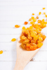 dried goji, cherry, raisin and plum fruits on white wood