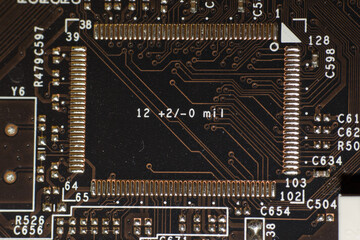 Closeup of electronic circuit board or PCB printed circuit board
