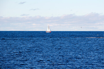 Baltic sea seascape, blue horizon and boats in Tallinn, Estonia.