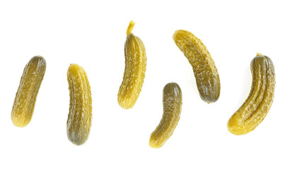Top view of pickled cucumbers isolated on a white background. Cornichons - small pickled cucumbers.