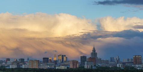 Naklejka premium Moscow city skyline before the thunderstorm, dramatic sky, panoramic view.