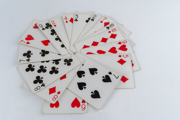 Playing cards for poker tricks on a macro background