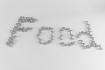 Vermicelli pasta lined word food with fork fast food