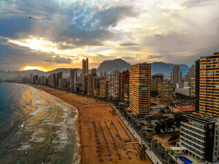 Benidorm, Spain. Aerial Benidorm coast skyline at foggy sunset.