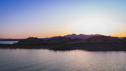 Obraz premium sunset on the river