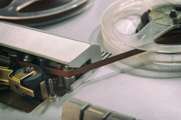 Old vintage reel-to-reel player. Tape recorder with spools. Bobbin tape recorder.