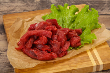 Raw beef meat sliced for cooking