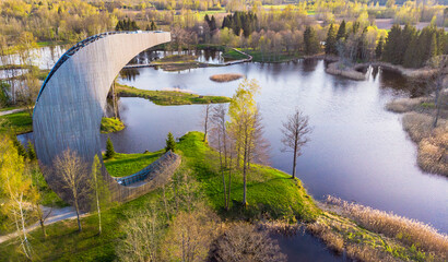Fototapeta na wymiar Moon shape observation tower among lakes of natural collapses in Kirkilai, Lithuania