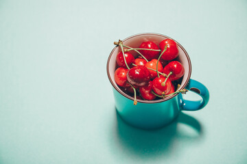 Obraz na płótnie Canvas Cherry fruits and coffee cup. 
