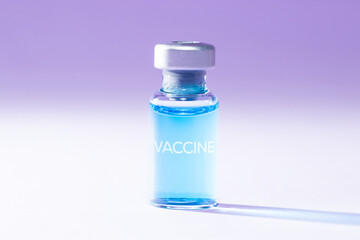 Close-up of a medical bottle with a blue liquid