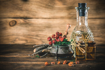 Magic potions on the witch doctor table close up background.