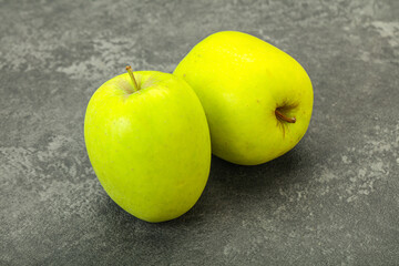Two ripe green sweet apples