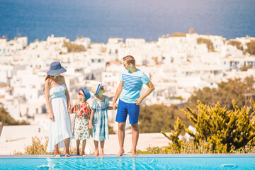 Family on vacation in Mykonos town, Greece