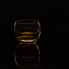Rum in Glas with Black Background