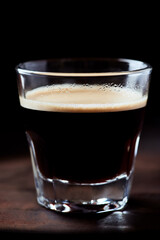 Cup of espresso on dark background. Close up.