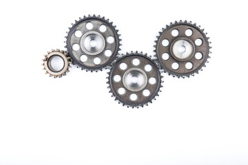 mechanism of cogwheels on a white background. concept of teamwork. several gears on a white background. 