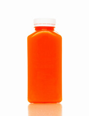 Cold-pressed carrot juice for detoxification against a white background. Juice from organic fruits and vegetables. Clean nutrition, weight loss, healthy nutrition concept. Detoxification.