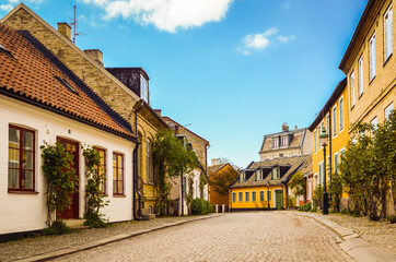 Street with old buildings in the downtown of Lund, Sweden - by itsflowingtothesoul