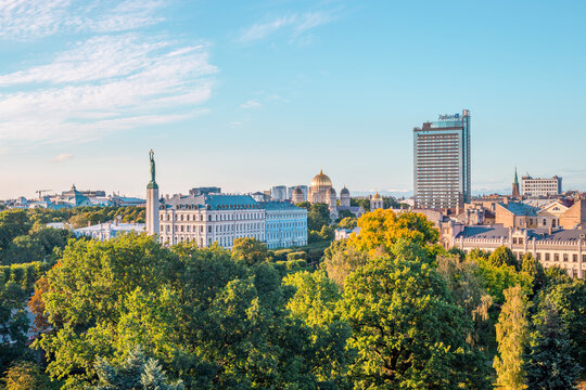 RIGA - 4 JULY, 2018: Amazing Aerial Panoramic View of the Statue of Liberty Milda in Riga, Park and City of Riga, Latvia - Image