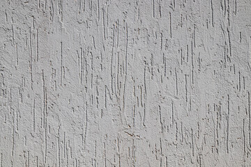 Rough painted putty surface as background.