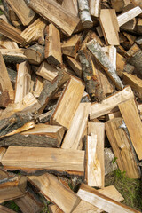 Birch firewood. A pile of split logs.