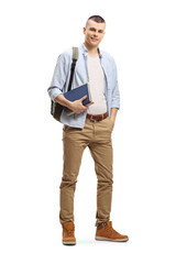 Male student with backpack and books