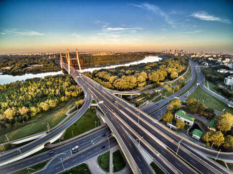 Warsaw, Poland 2018. Siekierkowski bridge modern suspension bridge over Vistula river in southern district,  along Trasa Siekierkowska street in Wawer, Praga Południe, Goclaw districts.