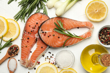 Composition with salmon meat and spices on white background, top view