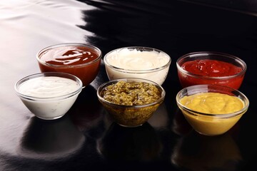 Sauces Assortment. Set of various sauces in bowls with ketchup, mayonnaise and mustard