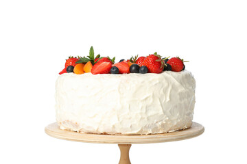 Berry cream cake on wooden stand isolated on white background